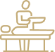 A therapy table with various therapeutic modalities, including a foam roller, massage tools, and therapy balls, set up for orthopedic rehabilitation.